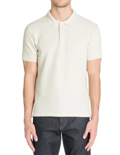 Celio Polo regular en coton stretch - beige^Homme Polos