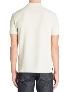 Celio Polo regular en coton stretch - beige^Homme Polos