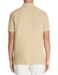 Celio Polo regular en coton stretch - beige^Homme Polos