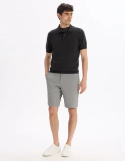 Celio Polo slim en maille coton mélangé - noir^Homme Polos